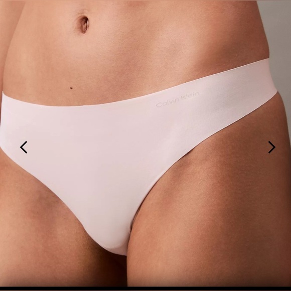 NWT Calvin Klein Invisible Micro Thong Size Large Nymphs Thigh Pink - Picture 7 of 7